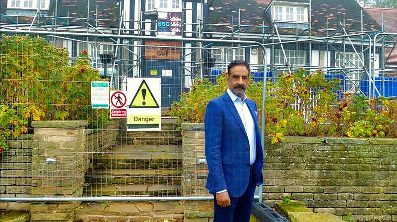 Mohammed Mahroof stood outside a closed Rose Garden Cafe