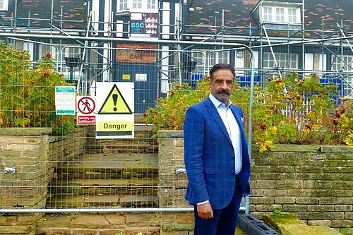 Mohammed Mahroof stood outside a closed Rose Garden Cafe